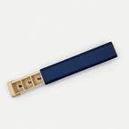 Navy and cream 7-day pill organizer with sliding tray partially open